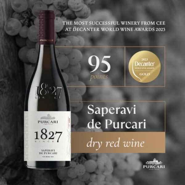 Saperavi de Purcari 1827 dry red wine bottle with Decanter Gold award, grapes background