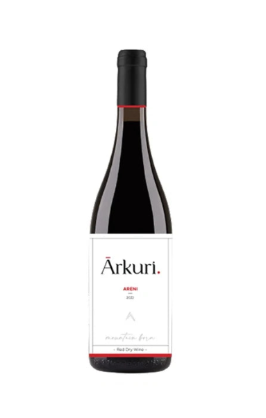 A bottle of Arkuri Areni red dry wine, featuring a white label with black and red text, set against a plain white background.