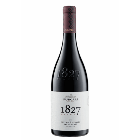 Red wine bottle with '1827' branding on a white background